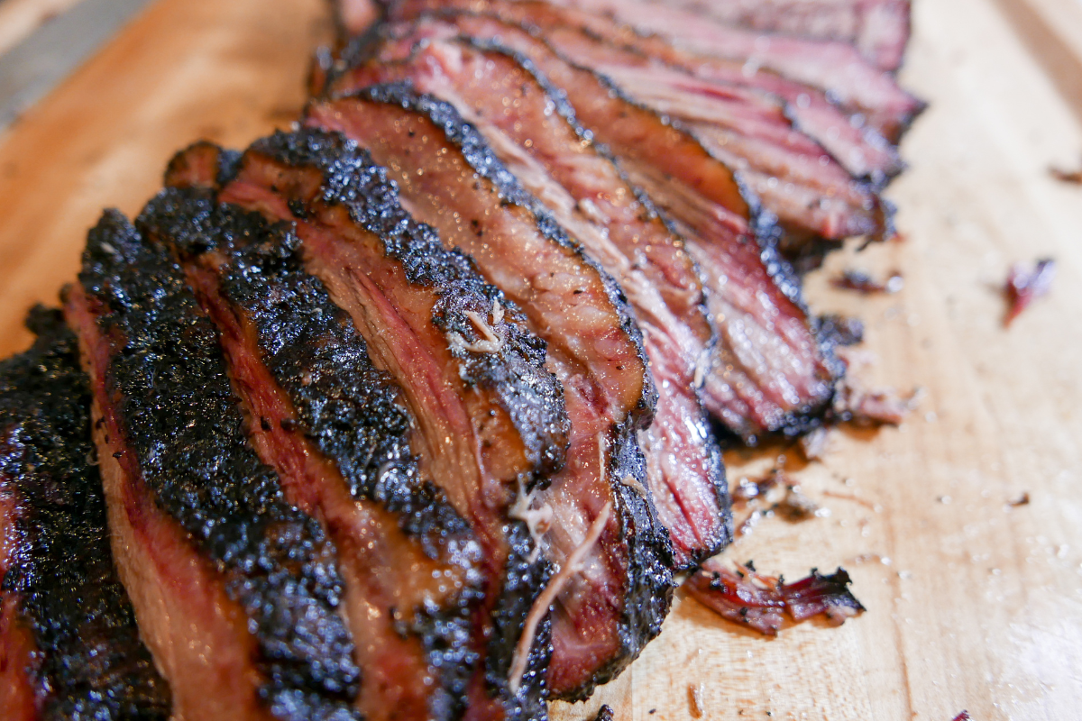 Smoked meatloaf on wooden cutting board