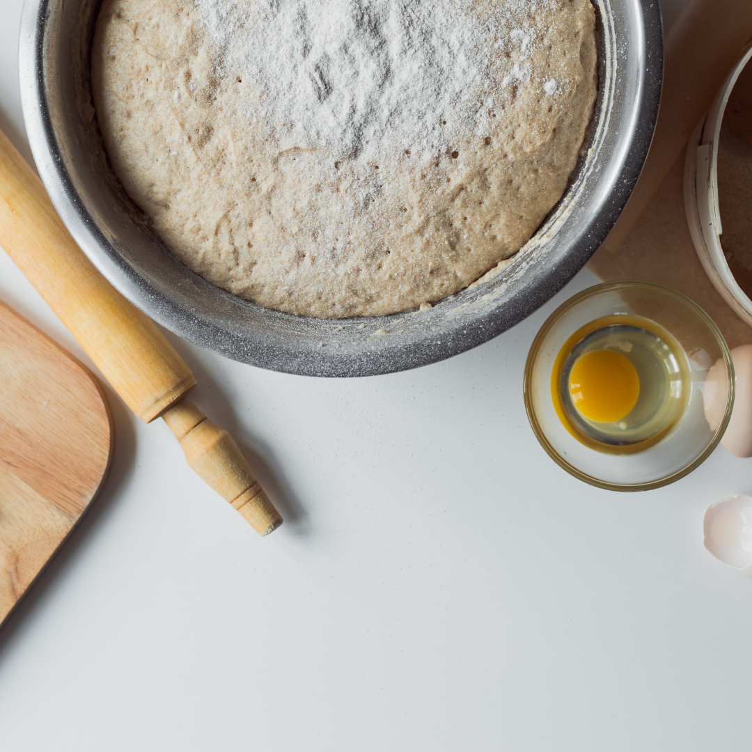 Olive Bread Baking - Dough rising in a bowl